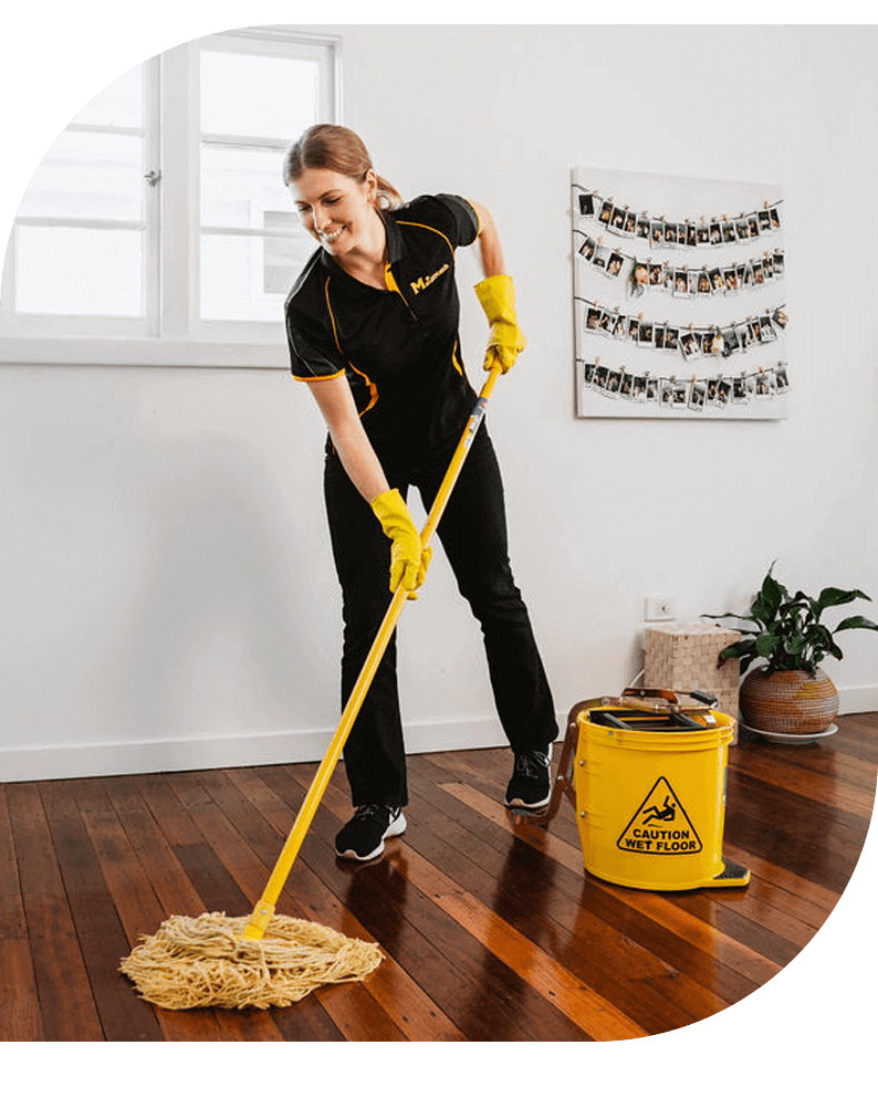 Maid2Match member mopping office floors