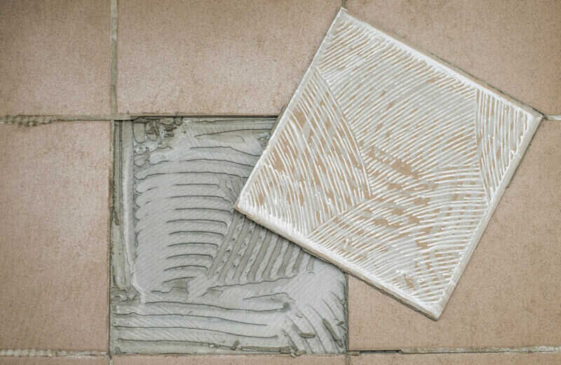 removing tile adhesive from old tiles