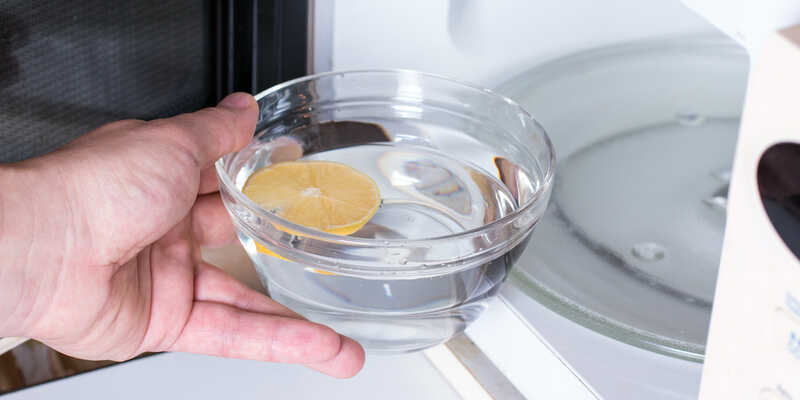 half a lemon in water for cleaning the microwave