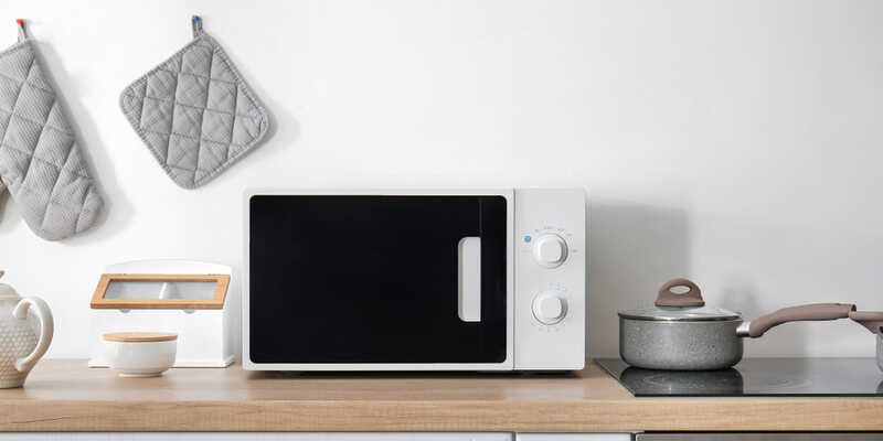 Modern microwave oven in kitchen