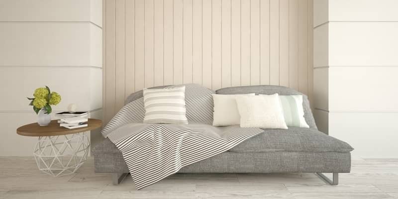 White room with sofa. Scandinavian interior design.