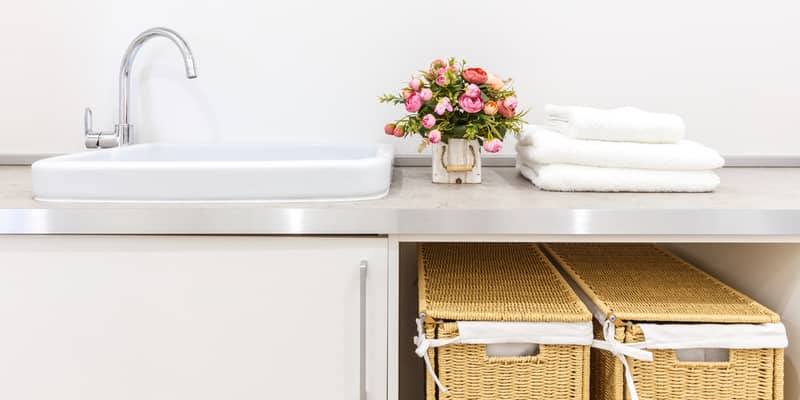 two hampers under the sink and counter