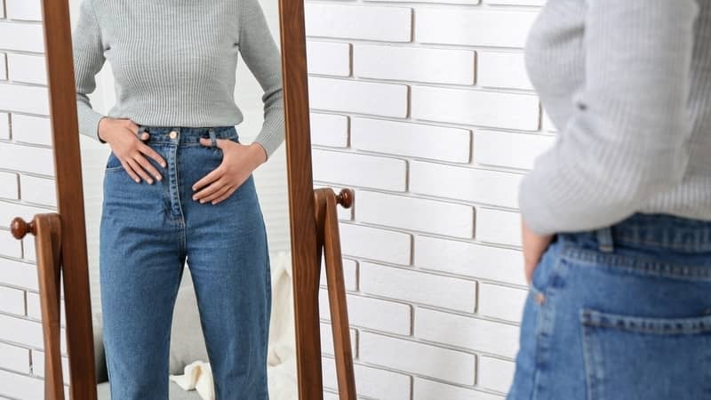 woman trying clothes on