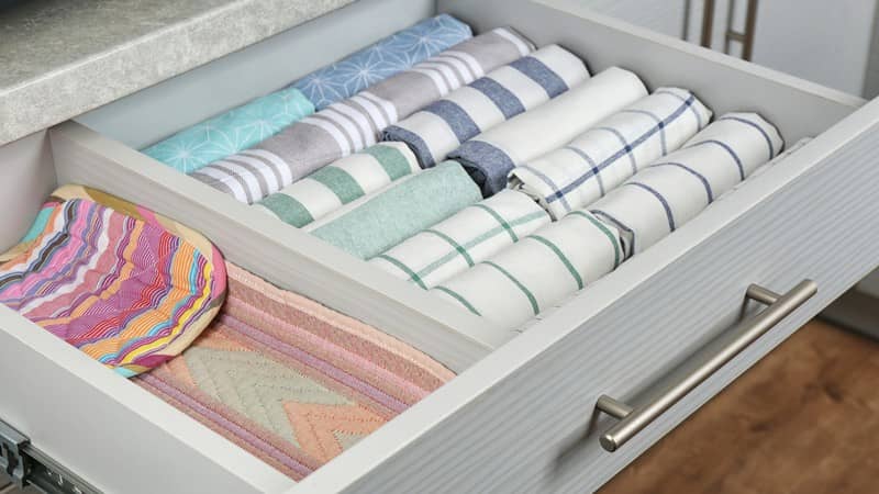 Open drawer with folded towels