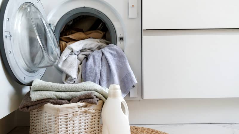 Loading a washing machine and washing clothes