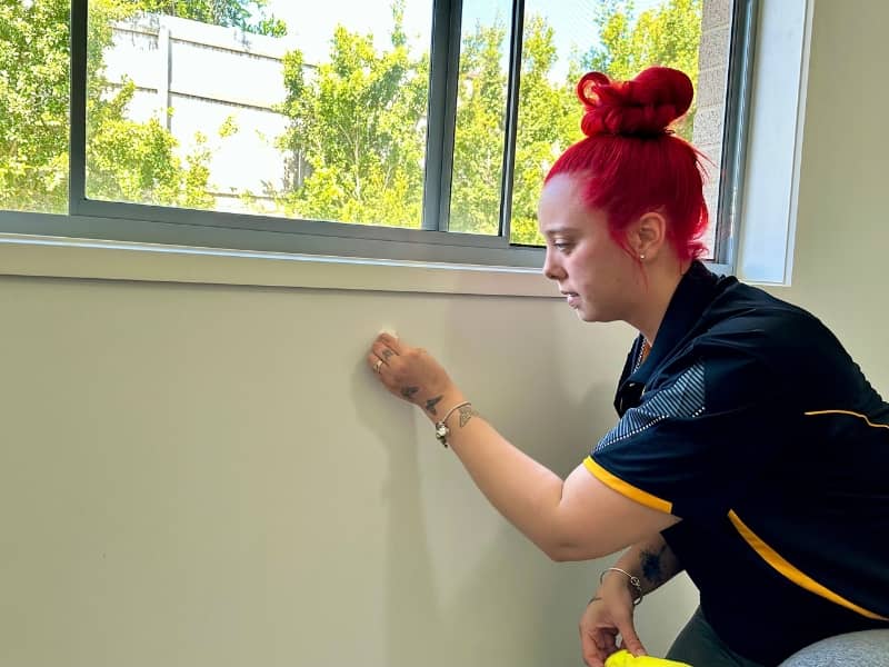 Brisbane professional cleaner Dani wall spot cleaning