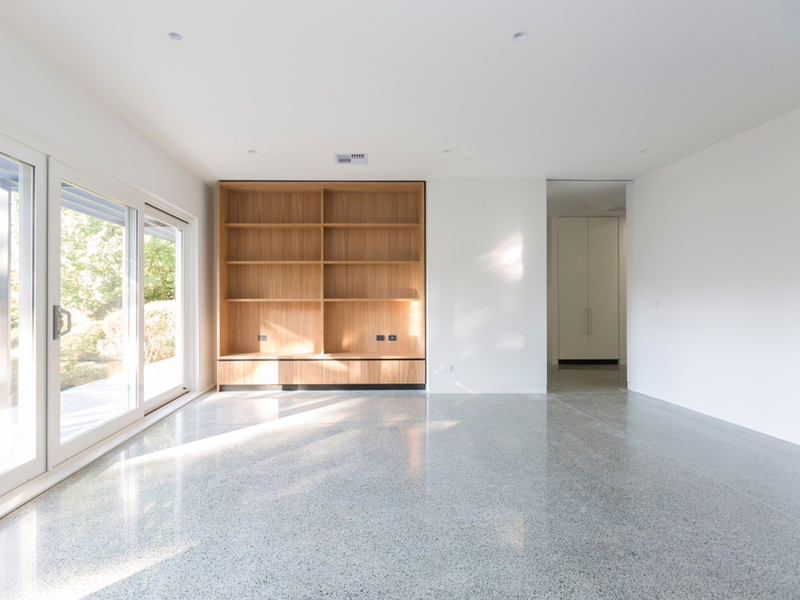 living room with polished concrete floor
