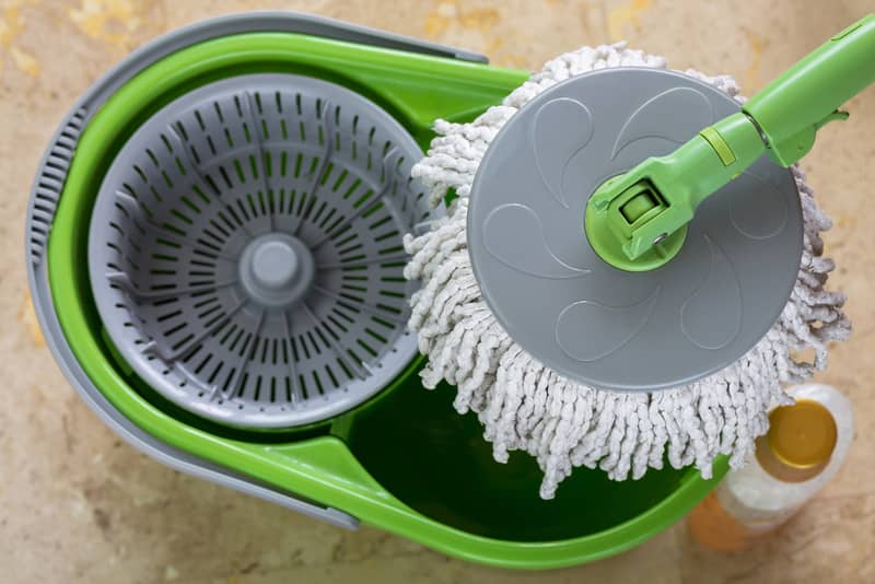 Mopping equipment set on polished concrete floor