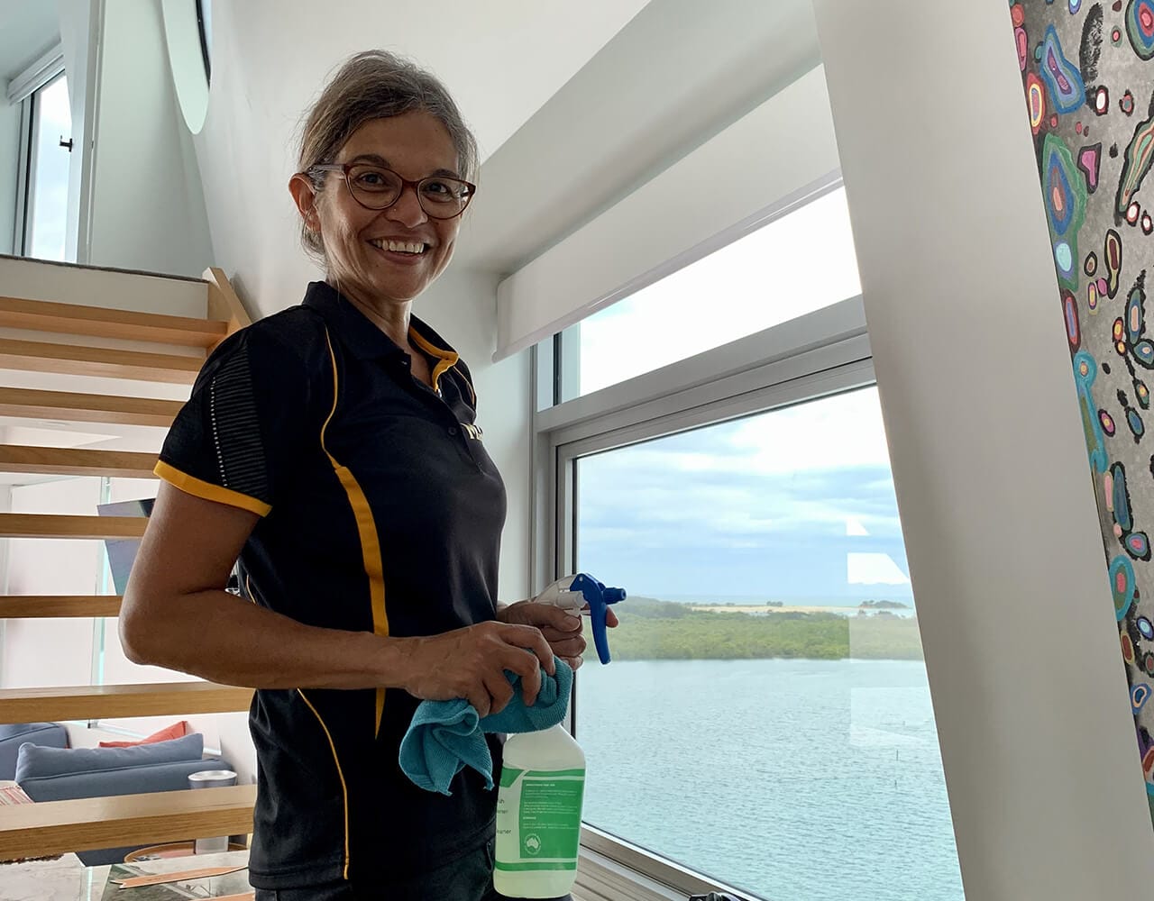 Brigitte cleaning the window