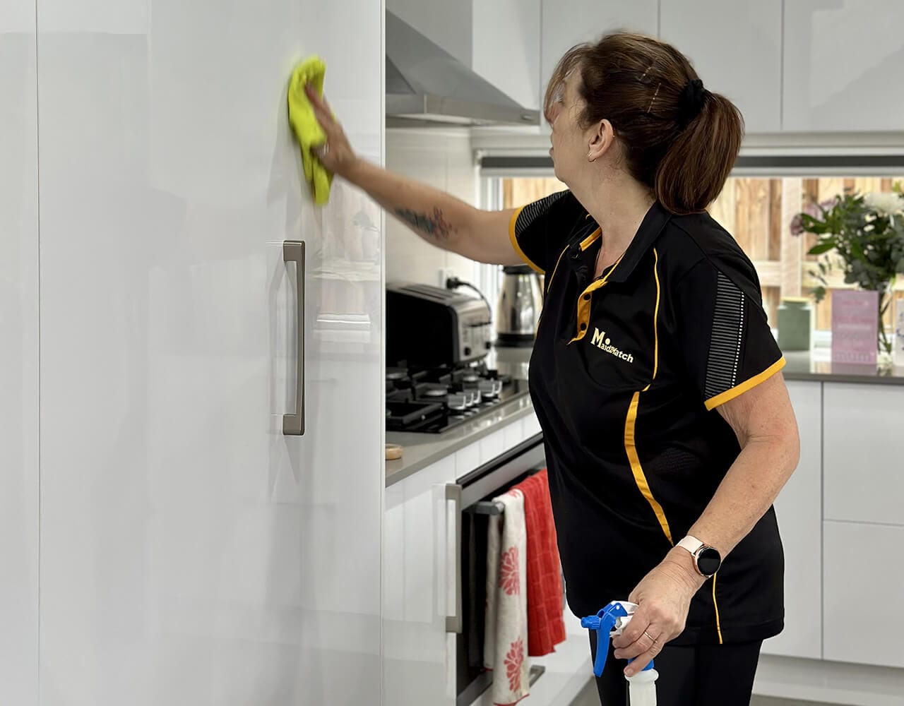 Sharon cleaning cupboards