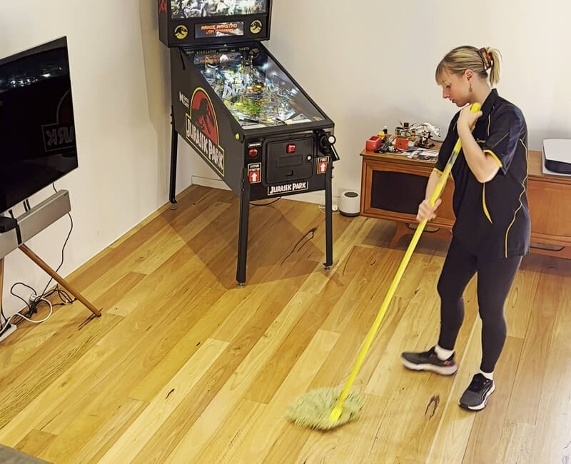 Casey-mopping-floating-floors Casey mopping floating floors in the living room