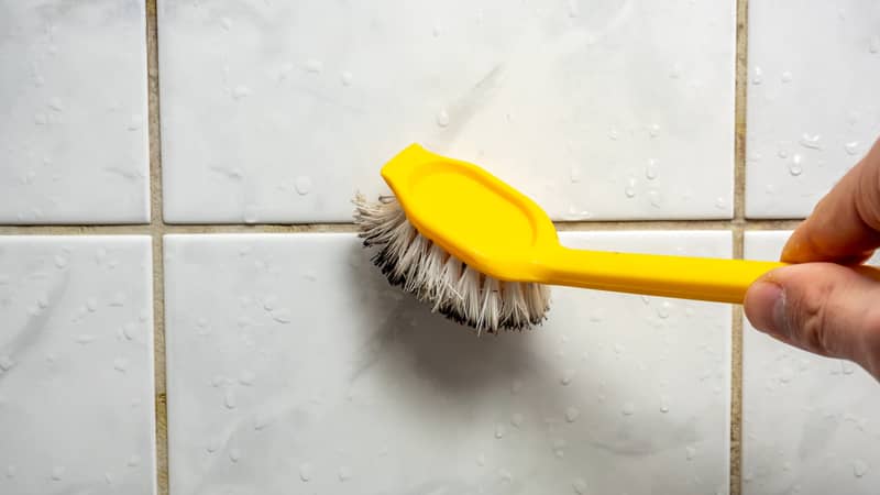 cleaning the mould on the tiles