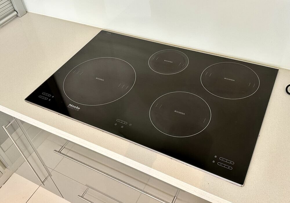 clean-induction-cooktop Induction cooktop newly cleaned by Maid2Match expert cleaner