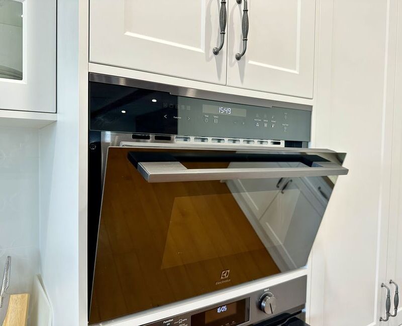 Clean oven exterior with oven door slightly open