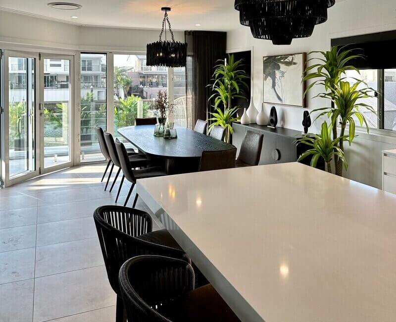Property with clean table and benchtop in the dining area