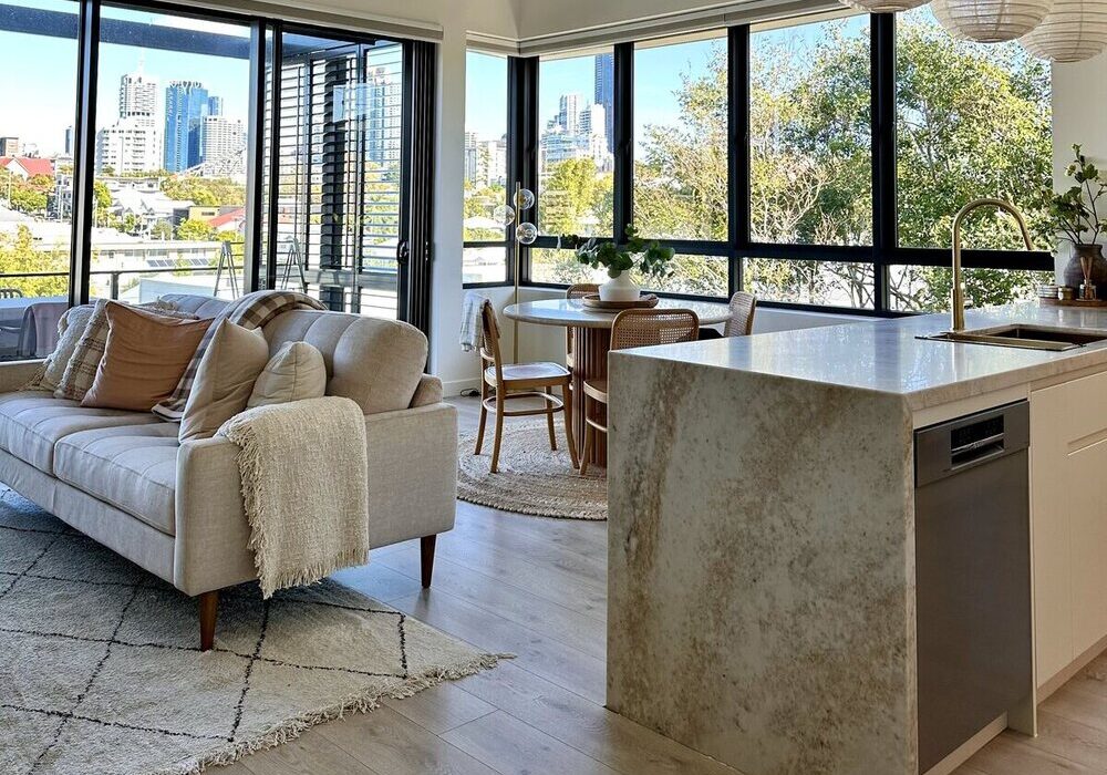 clean-living-and-dining-area-of-a-property Property with clean living and dining area and a benchtop