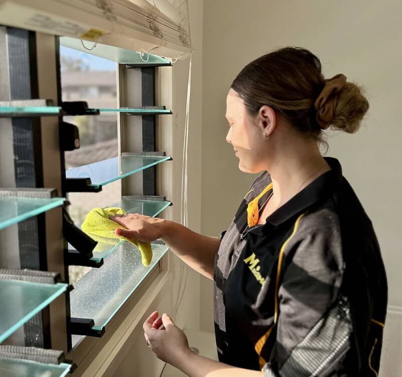 Maid2Match spring cleaning Alison wiping windows