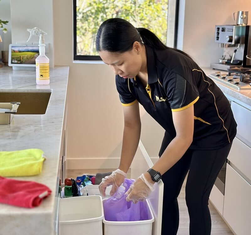 Maid2Match house cleaner Paige cleaning rubbish bins