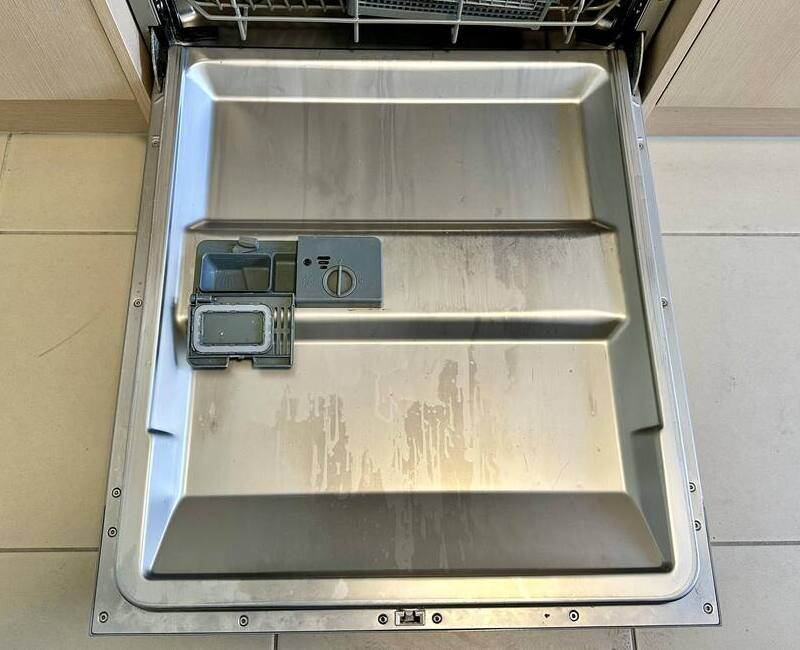 dishwasher door with limescale build up