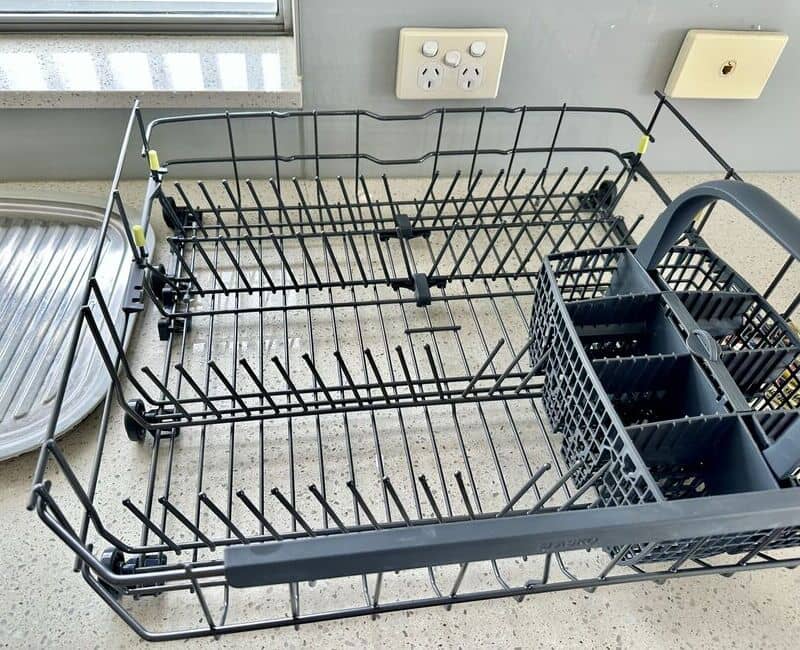 dishwasher rack set on top of a bench top