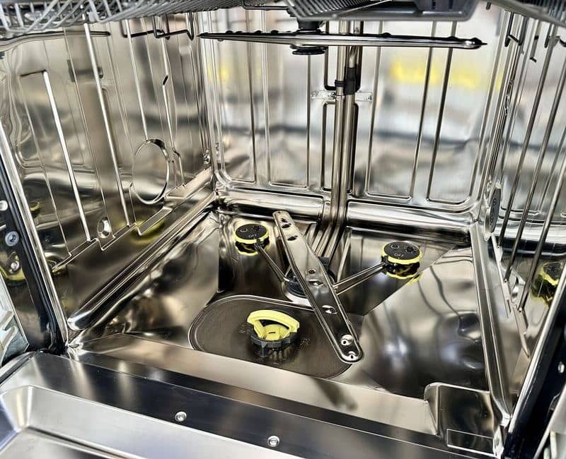 the interior of an open dishwasher