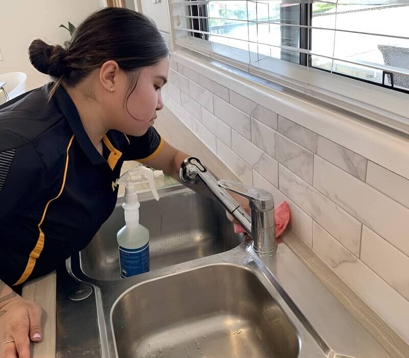 Maid2Match Shania cleaning kitchen sink area