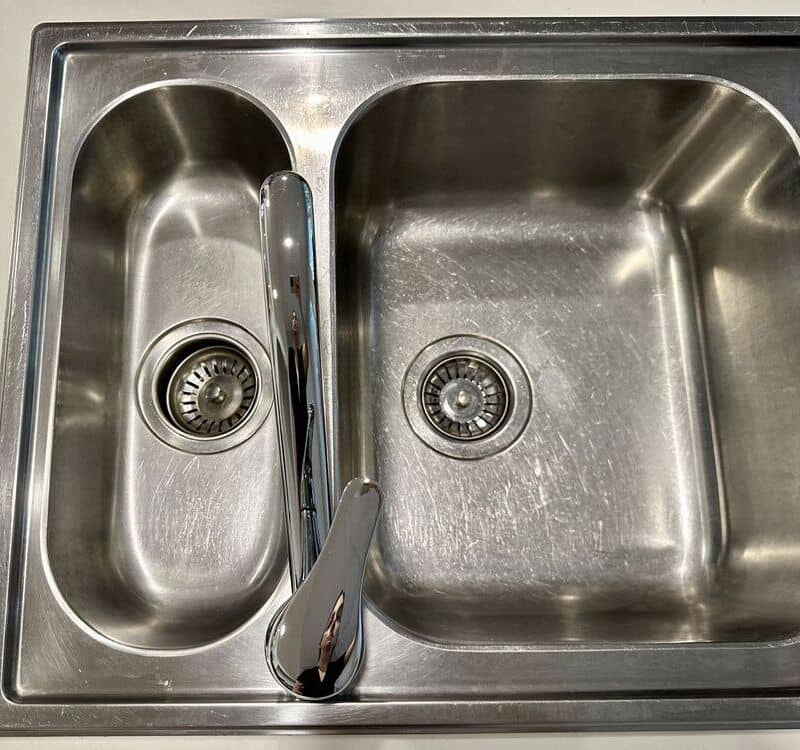clean stainless steel kitchen sink close up