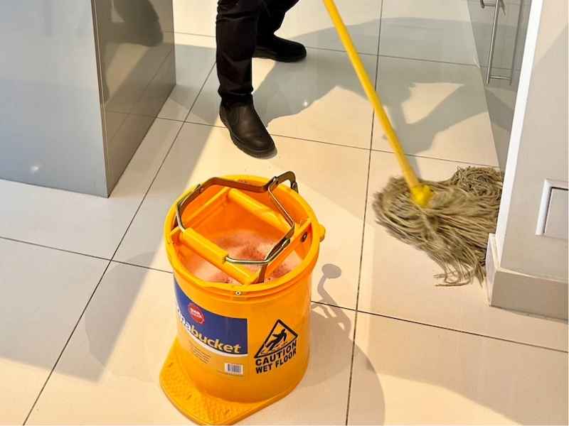 mopping with soapy water