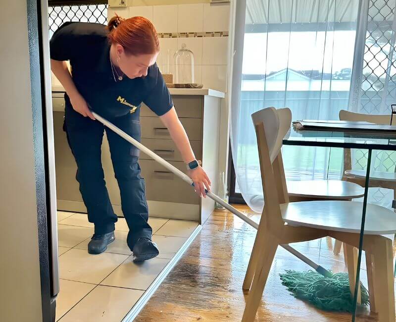 Maid2Match house cleaner Adelaide mopping Maid2Match house cleaner in Adelaide mopping inside a home