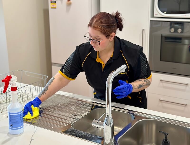 Paris-cleaning-kitchen-sink Maid2Match Geelong Professional Cleaner, Paris cleans a kitchen sink