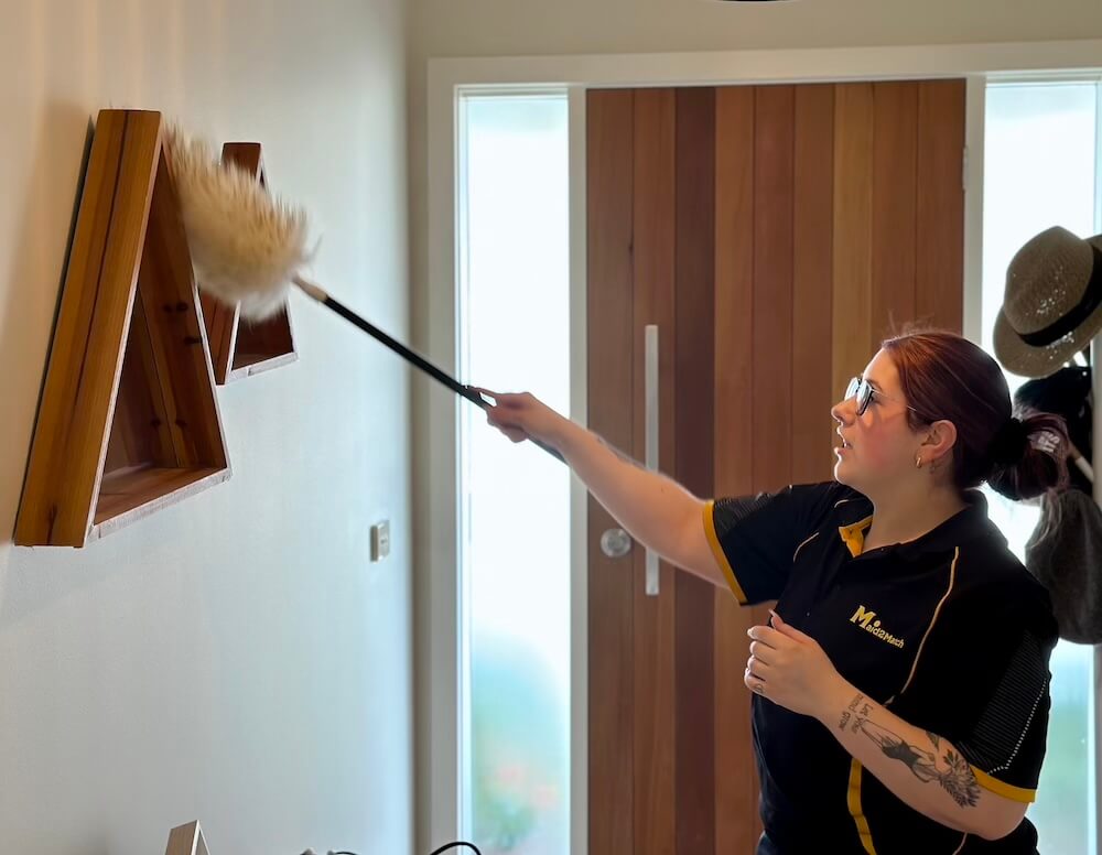 Professional cleaner Paris dusting furniture Maid2Match Professional House Cleaner Paris dusting wall fixtures