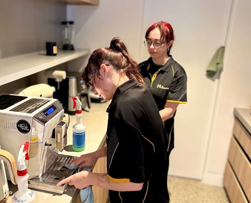 Maid2Match trainer and trainee house cleaning session