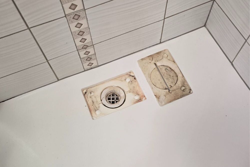open shower drain