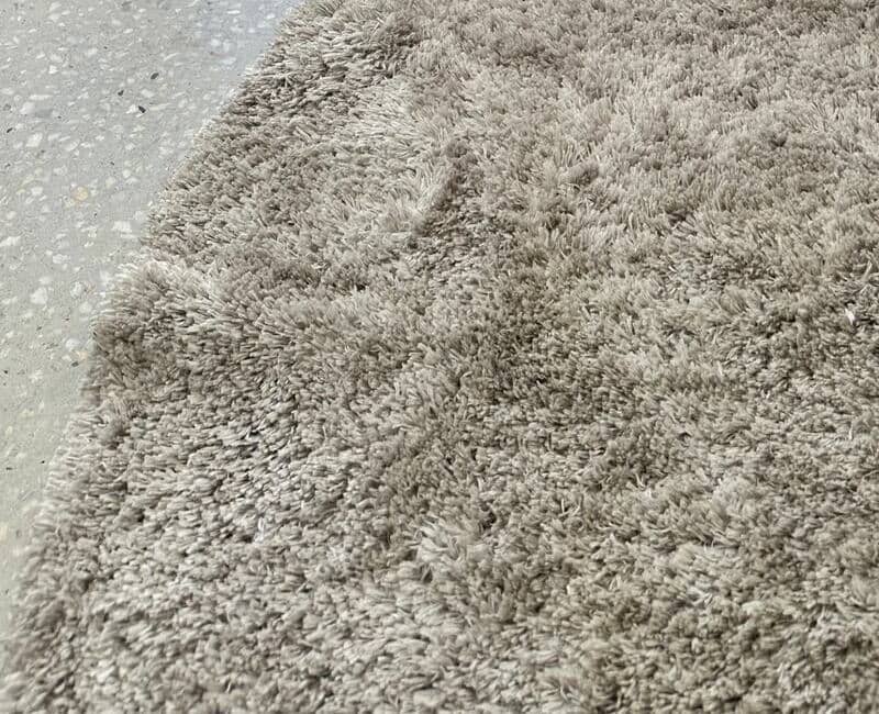 fluffy grey shag rug up close
