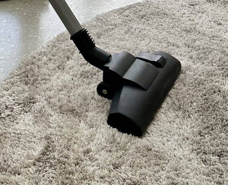 vacuuming a shag rug