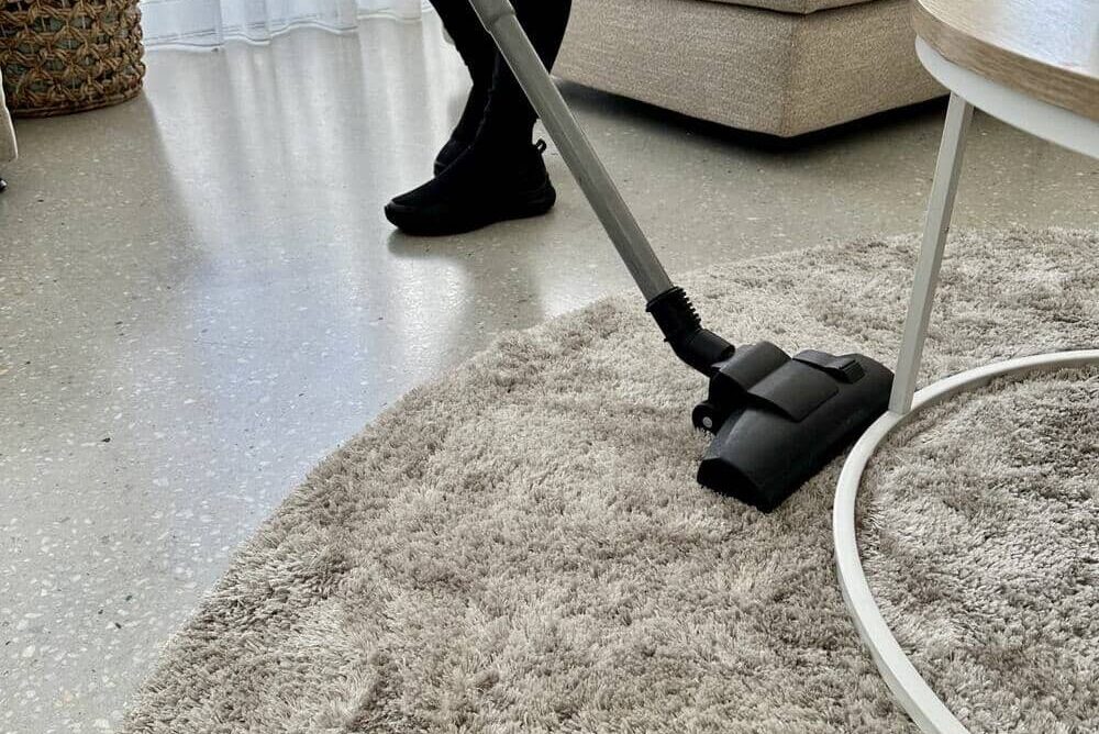 vacuuming a shag rug