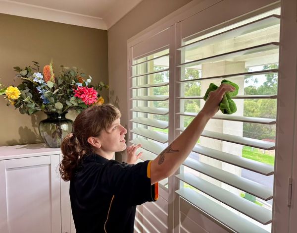 Maid2Match DVA Cleaning Brisbane professional cleaner Kayleigh cleaning windows