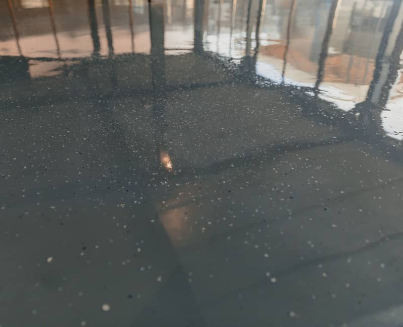 close-up of dark and shiny indoor epoxy floor