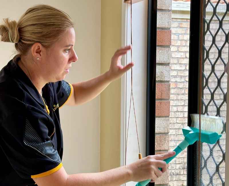 Maid2Match Brisbane professional house cleaner Jarna cleaning security screens