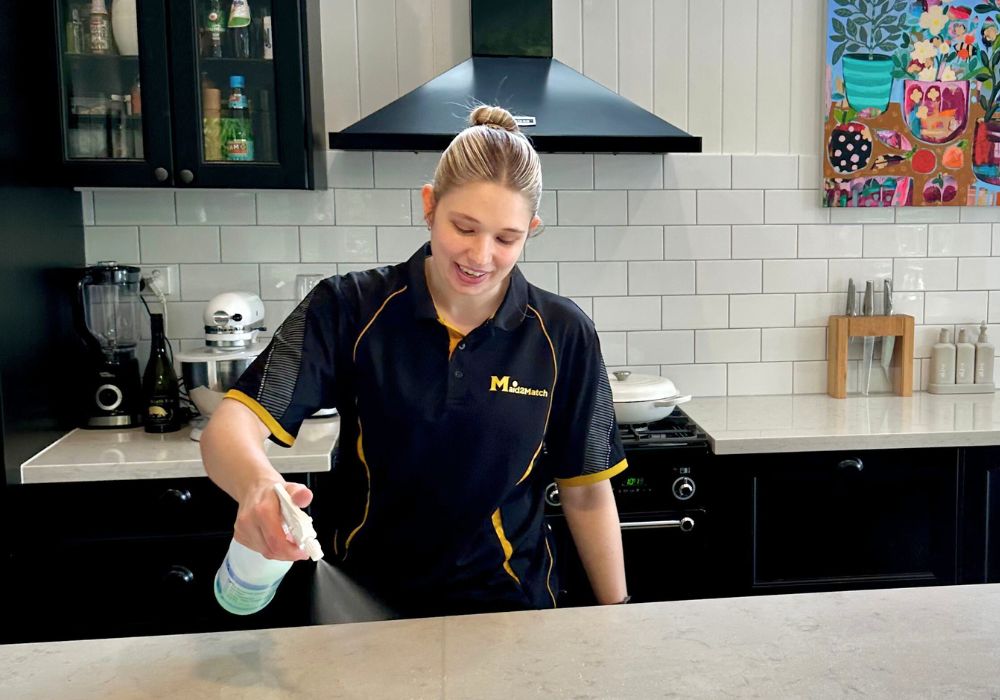 Brisbane-DVA-cleaner-cleaning-benchtop Maid2Match Brisbane professional DVA house cleaner Kate-lyn cleaning benchtop