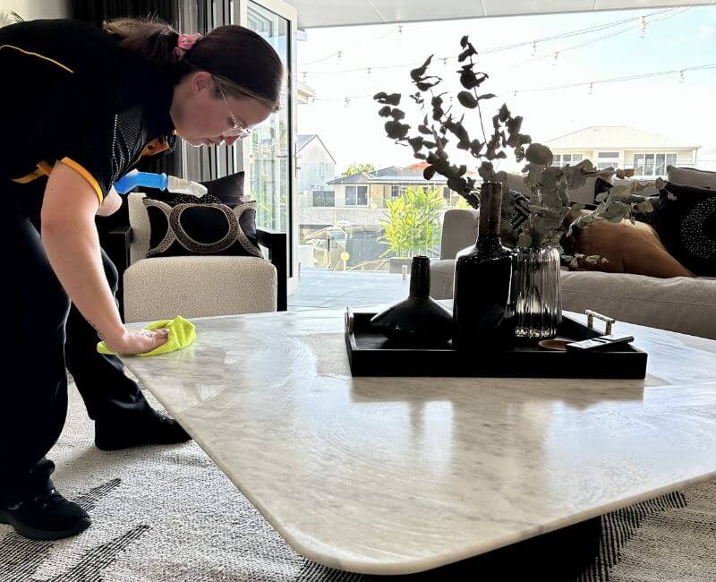 Maid2Match expert cleaner cleaning marble coffee table