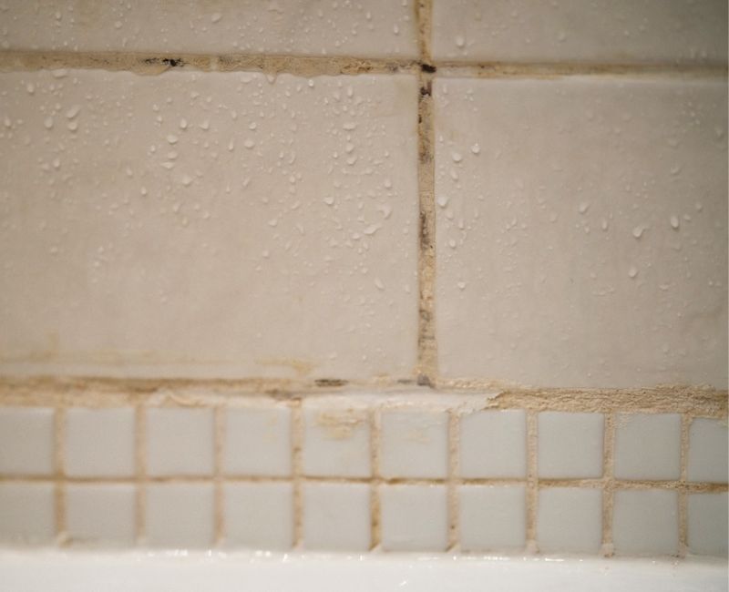 Close up of grout turning black