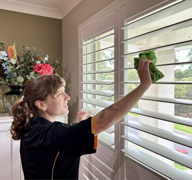 Maid2Match expert house cleaner Kayleigh cleaning windows