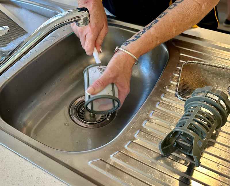 Maid2Match Brisbane house cleaner Liz washing dishwasher filter parts