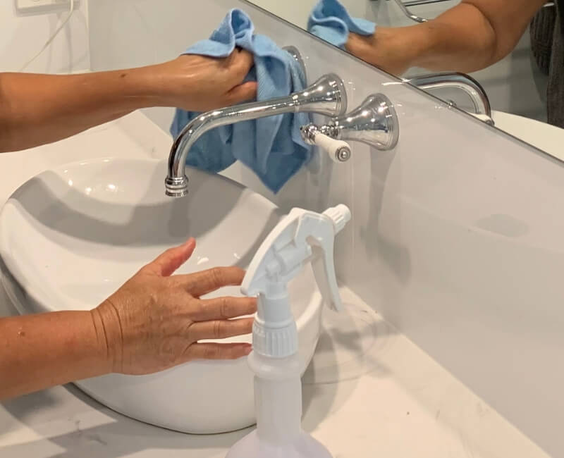 Cleaning bathroom sink faucet