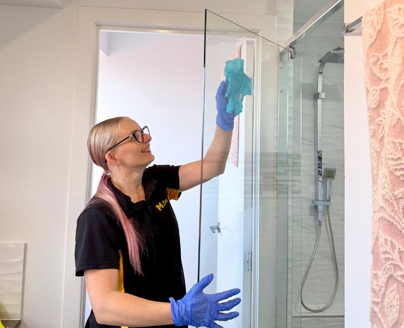 Trusted Maid2Match house cleaner cleaning shower glass