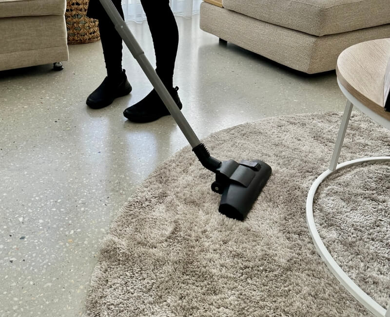 using vacuum to clean shag rug