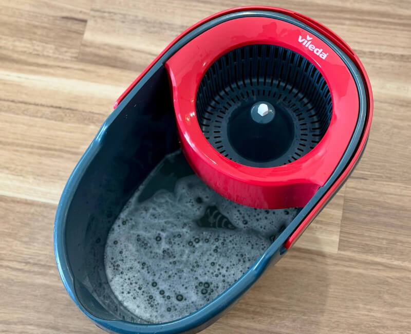 Mop bucket with water and cleaning product